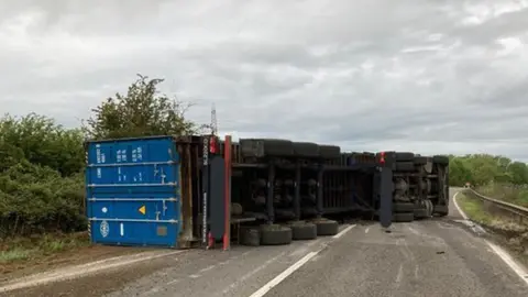 BCH Road Policing Unit The overturned lorry on the northbound carriageway at Water Newton, Cambridgeshire