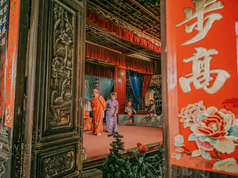 Long Jing Behind the scenes during a performance by the Yunnan Opera, China