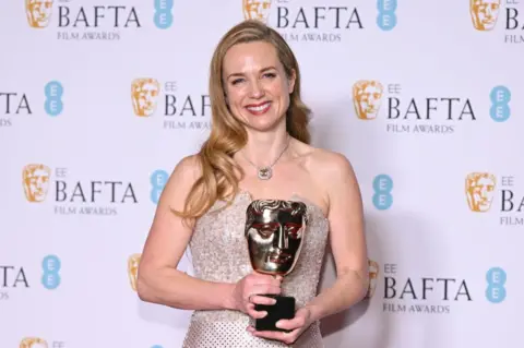 Getty Images Kerry Condon poses with her bafta for best supporting actress