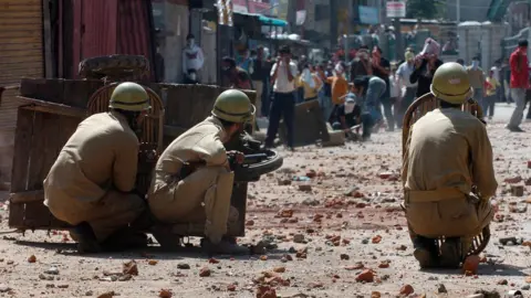 Getty Images Representational image of stone-throwers in Kashmir