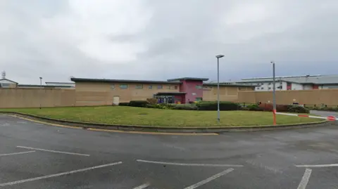 Google The exterior of HMP Peterborough