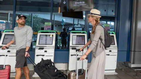 Getty Images passengers at airport