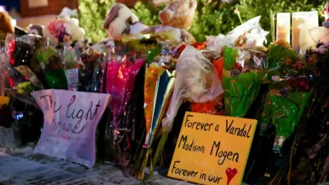 Reuters Flowers for the victims