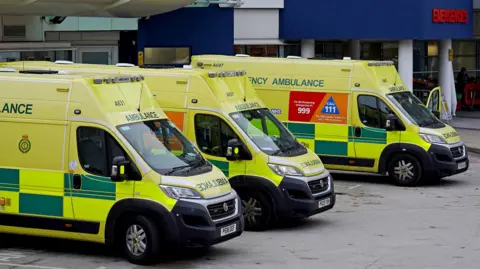 PA Media Ambulances waiting outside an emergency department