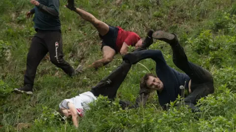 Gloucester cheese-rolling veteran breaks all-time record