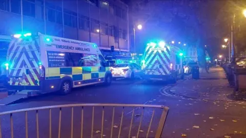 Robert Ellis Emergency service outside the town hall