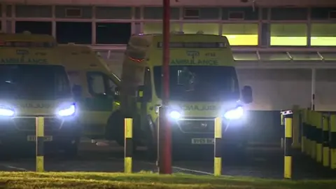 BBC Waiting ambulances at City Hospital in Birmingham