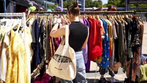 Mark Waugh Looking for clothes at We Invented The Weekend in Saturday