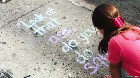 Sophie Sandberg Sophie Sandberg in New York writing on the pavement