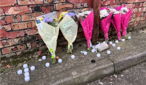 Martin Barber/BBC Floral tributes near Wellington Road, Great Yarmouth