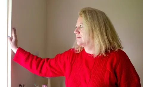 BBC Claire Bastow seen in her home