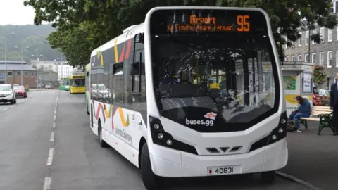 BBC Bus at stop.