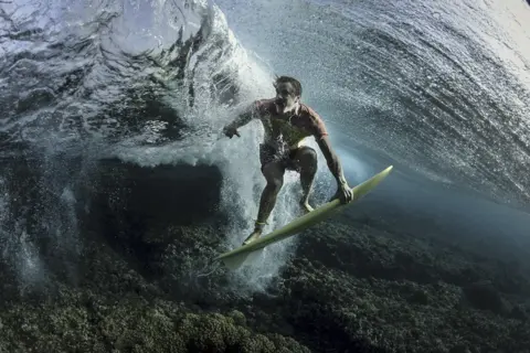 Rodney Bursiel / National Geographic An underwater shot of pro surfer Donavon Frankenreiter
