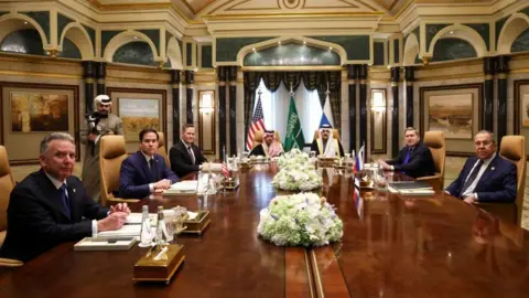 Reuters American State Secretary Marco Rubio with Saudi Minister of Foreign Affairs Prince Faisal Bin Farhan Al Saud Bin Mohammad Al-Aiban, US National Safety Advisor Mike Witkoff, Russian Minister Sergei Lavrov and Russian External Policy Presidential Vladimir Putin Yuri Ushakov, in Diriyah Palace in Riyadh