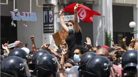 Getty Images A demonstration in Tunisia in 2021