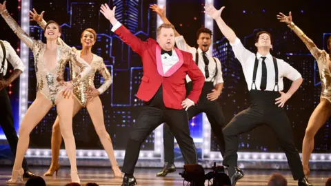 Getty Images James Corden on stage during the 2019 Tony Awards