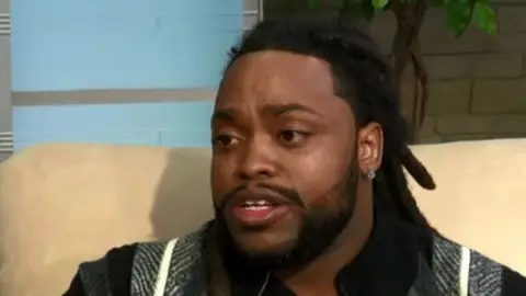 CBS Mr McCowns, who was handcuffed by police, called the incident "highly embarrassing"