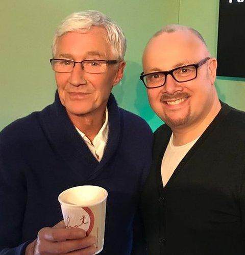 Paul O'Grady stood with Malcolm Prince, the producer on his radio show since 2009