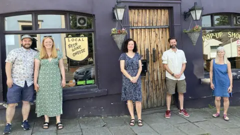 Getty Images Campaigners outside the Windmill pub in Windmill Hill, Bristol