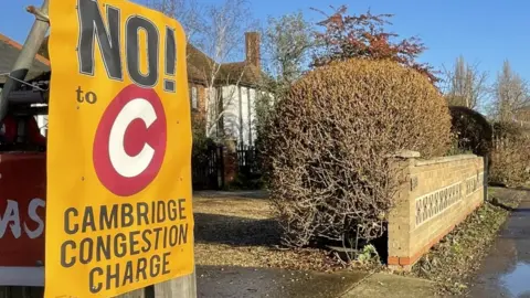 Ben Schofield/BBC A banner campaigning against the propose Cambridge congestion charge