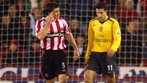 PA Media Chris Morgan and Robin Van Persie