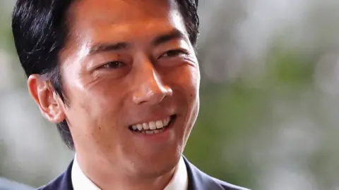 Reuters Japan's new Environment Minister Shinjiro Koizumi arrives to Prime Minister Shinzo Abe's official residence in Tokyo