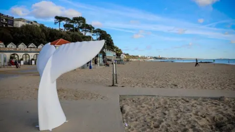 Julia's House Mermaid tail sculpture