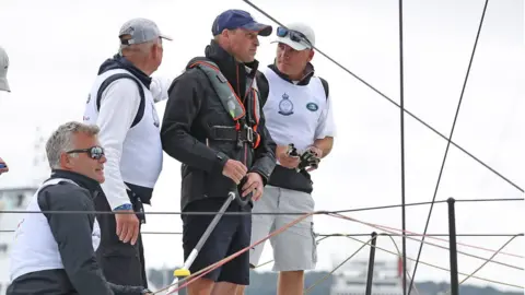 PA Media Prince William and his team