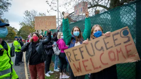 Getty Images Refugees welcome demonstrators