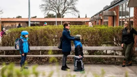 AFP Children waiting to go into school in Copenhagen