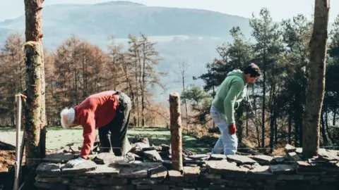 Joshua Rhys Photography The cabin being rebuilt