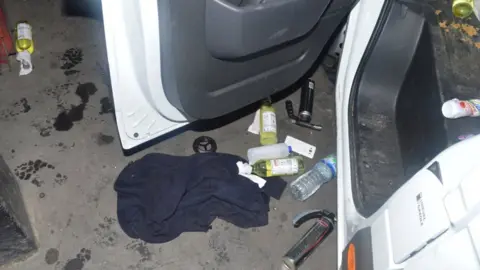 Met Police Wine bottles filled with a flammable liquid with rags tied to their necks