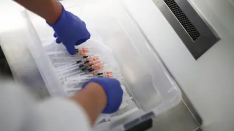 EPA Covid-19 vaccination in the refrigerator of a pharmacy laboratory in Warsaw, Poland, 28 December 2020