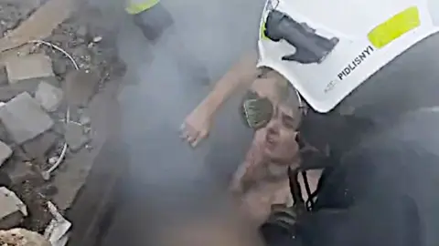 Man rescued from rubble