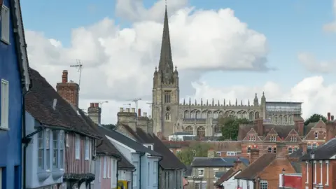 Getty Images A street on a hill in Saffron Walden, with its cathedral in the background