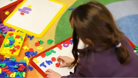 PA Media Child playing