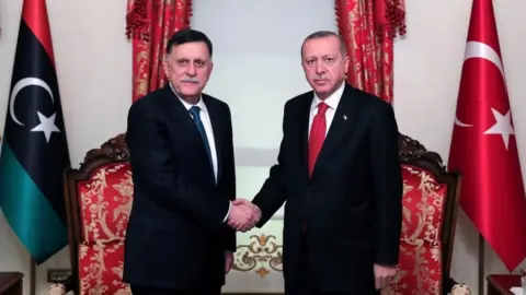 Reuters Fayez al-Sarraj and Recep Tayyip Erdogan