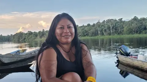 Alessandra Munduruku Alessandra says mining has caused disease and destruction in her community for decades