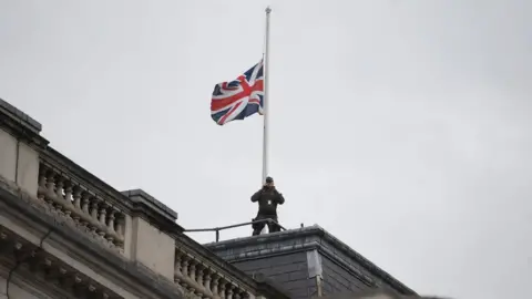 NEIL HALL/EPA-EFE/REX/Shutterstock A flag