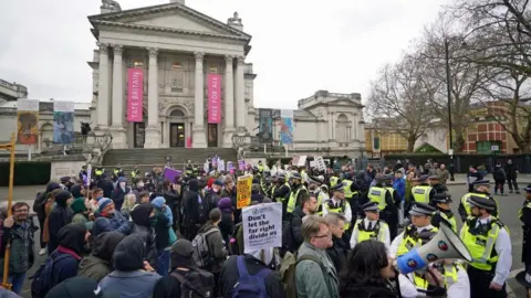 PA Media Protesters outside Tate Britain