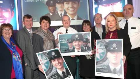 PA Media Politicians and police chiefs gather for PSNI recruitment launch