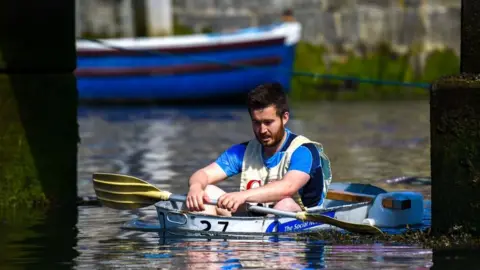 JONATHAN BURTON - PHOTOGRAPHER A competitor during the race