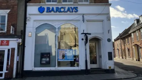 Guy Campbell/ BBC Barclays Bank in Beccles. White building with the blue Barclays logo.