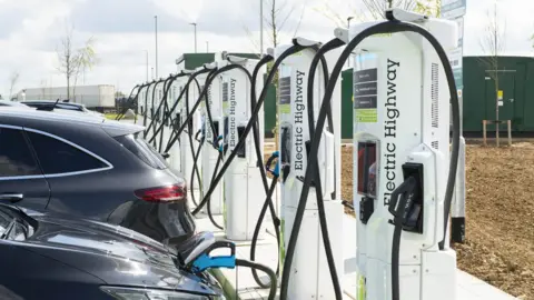 PA Media EV charging in a car park