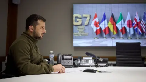 EPA Ukrainian President Volodymyr Zelensky during the video conference with G7 leaders.