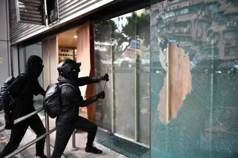 AFP Protesters vandalise the Cheung Sha Wan local government offices during a demonstration in Hong Kong on October 6, 2019