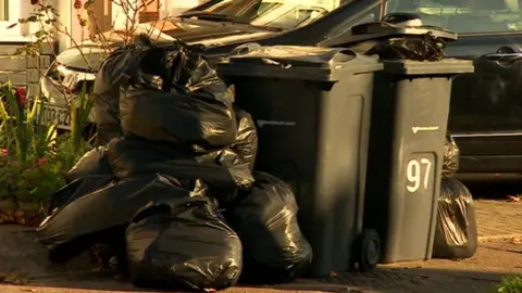 Bin bags piled up