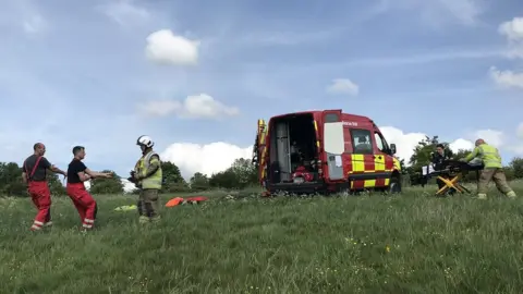 Bedfordshire Fire and Rescue Emergency services rescuing paraglider