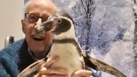 Berkley Care Group Care home resident with penguin