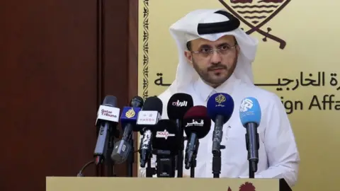 Reuters File photo showing Qatar's foreign ministry spokesman Majed al-Ansari in Doha, Qatar (28 November 2023)